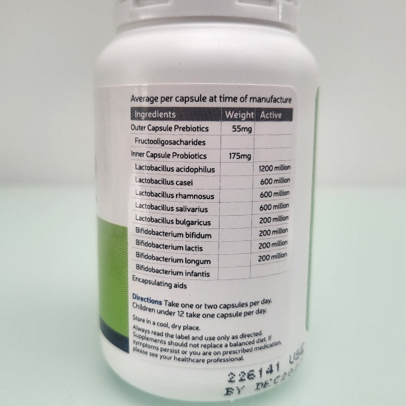 Close-up of Probiotic Multi 9 supplement bottle label with ingredients list, including Lactobacillus and Bifidobacterium strains for gut health, and usage directions.