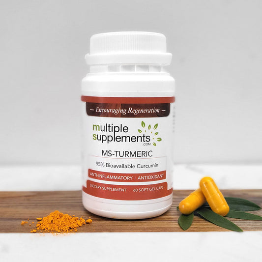 MS-Turmeric bottle with 95% bioavailable curcumin, 2 yellow soft gel capsules, and turmeric powder on a wooden board