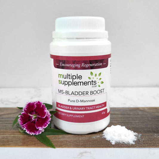 MS-Bladder Boost D-Mannose powder for bladder and urinary tract health, 60g, on a wooden surface with a flower.
